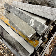 Brandy Rubble Edging Stone in natural gray and soft tan tones, supplied on a 2,000 lb. pallet.
