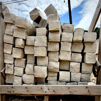 Brandy Rubble Edging Stone in natural gray and soft tan tones, supplied on a 2,000 lb. pallet.