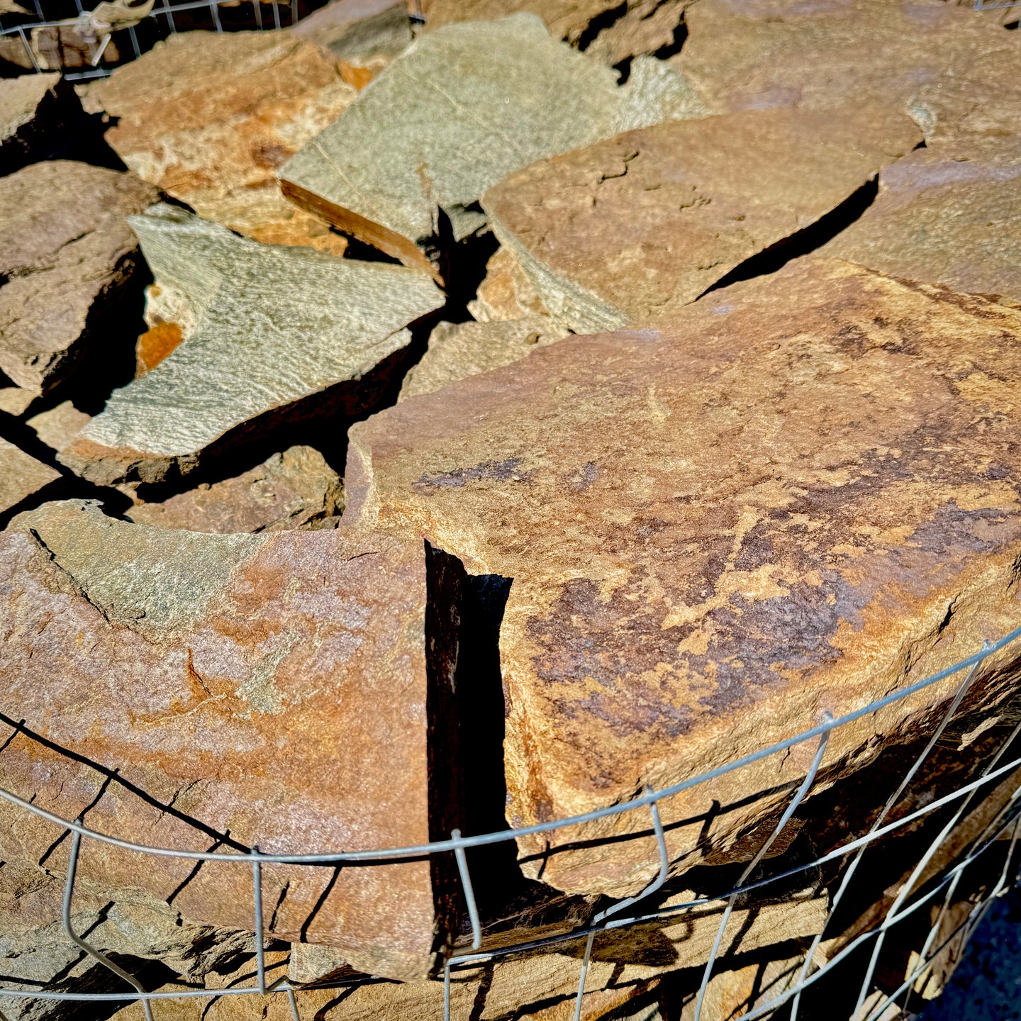 Close-up of Laurel Ridge Thin Stone showing rich brown natural granite color variation