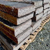 Detail of Rock Island Lilac step treads with gray-lilac cleft surface, dark banding, and natural stone grain
