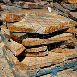 Large, irregular Summer Tan flagstone pieces with natural edges and varied shapes.