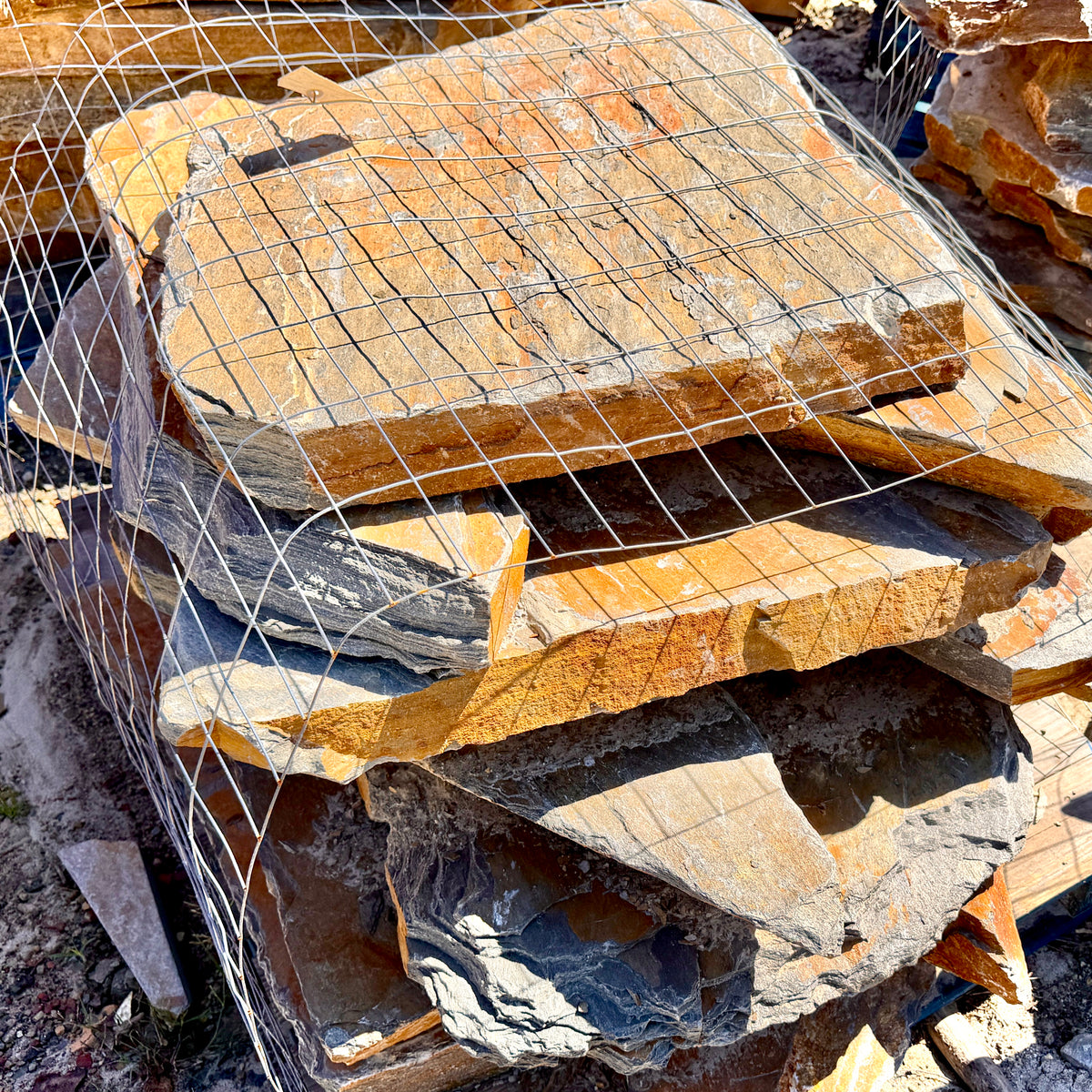 Summer Tan natural granite flagstone from North Carolina, available by the ton.