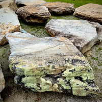 Large-format Tennessee natural sandstone slab for custom grotto, waterfall, and landscape feature construction.