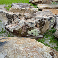 Large Tennessee sandstone fieldstone boulder showing its natural shape and weathered texture